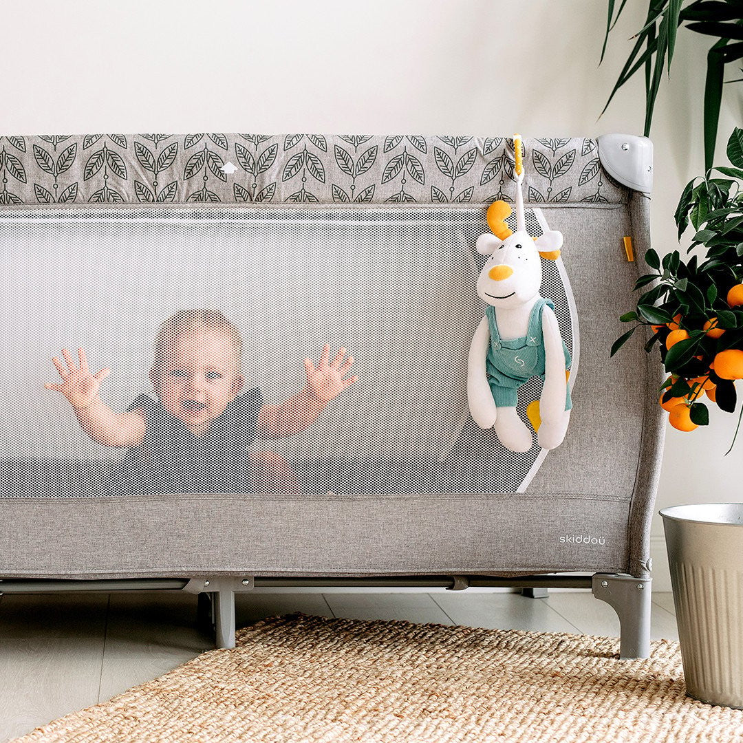 Jucarie ren de plus pentru copii Skiddou Sovn, cu sunete muzicale, 35x12 cm